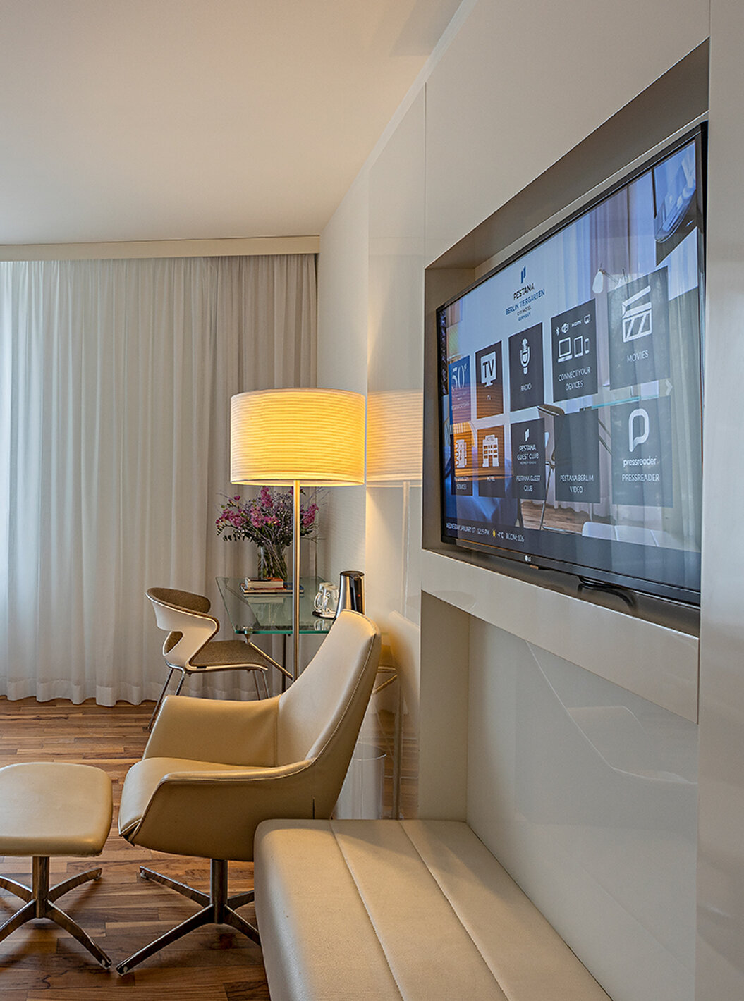 Family Deluxe has a desk, lounge chair and TV