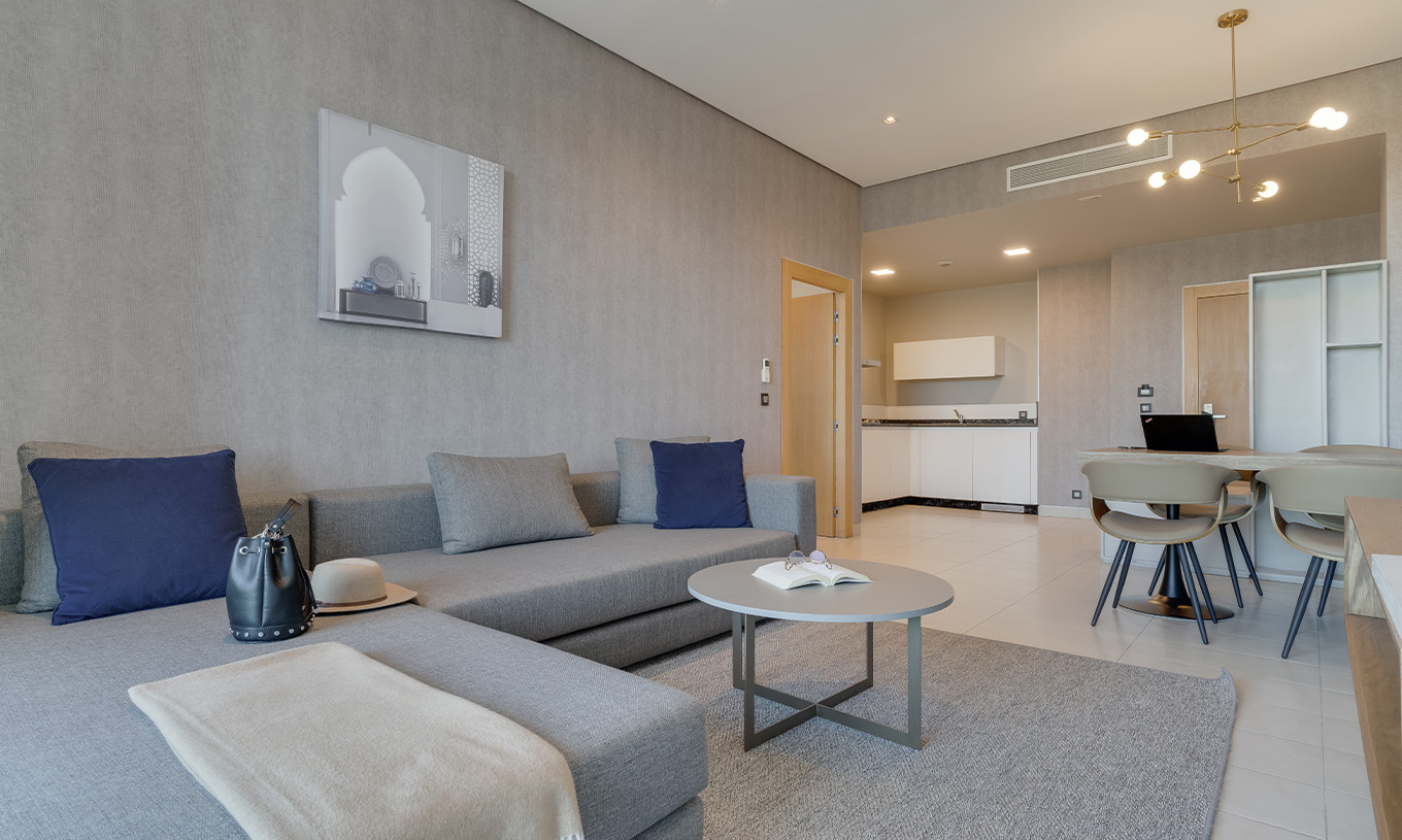 The Premium Superior Suite at Pestana Casablanca has a comfortable sofa with chaise longue and a kitchenette