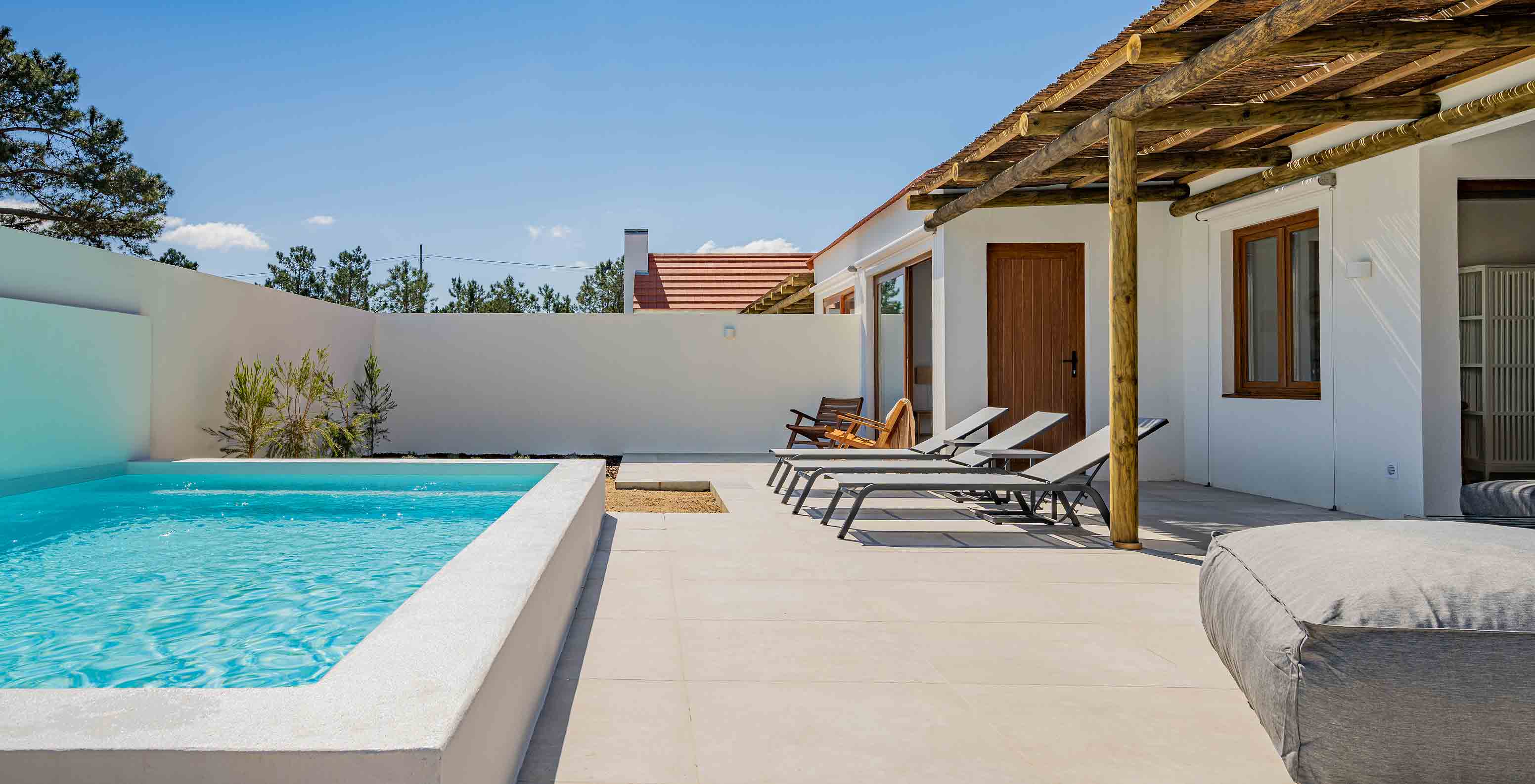 The Premium Villa at Pestana Comporta Village Residences has a pool, sun loungers, and an outdoor pergola