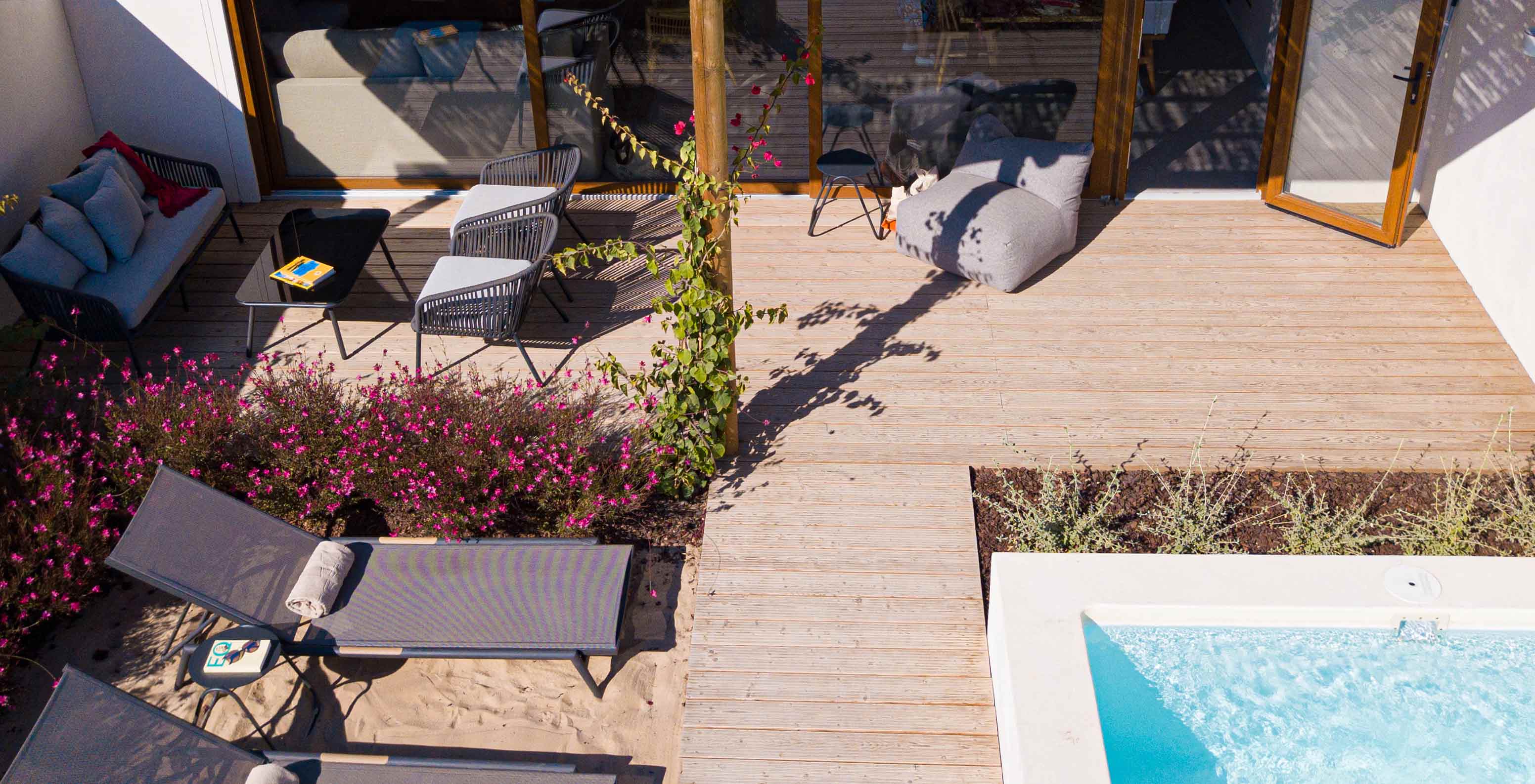 The Standard Green Villa at Pestana Comporta Village Residences has a terrace with a pool, sun loungers, and plants