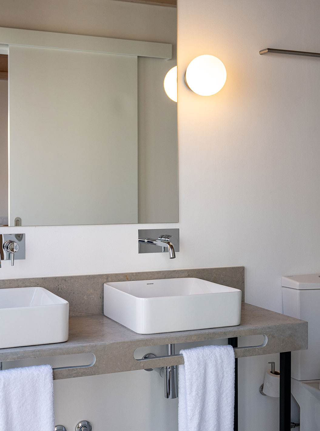 The Superior Villa at Pestana Comporta Village Residences has a bathroom with two sinks and a mirror