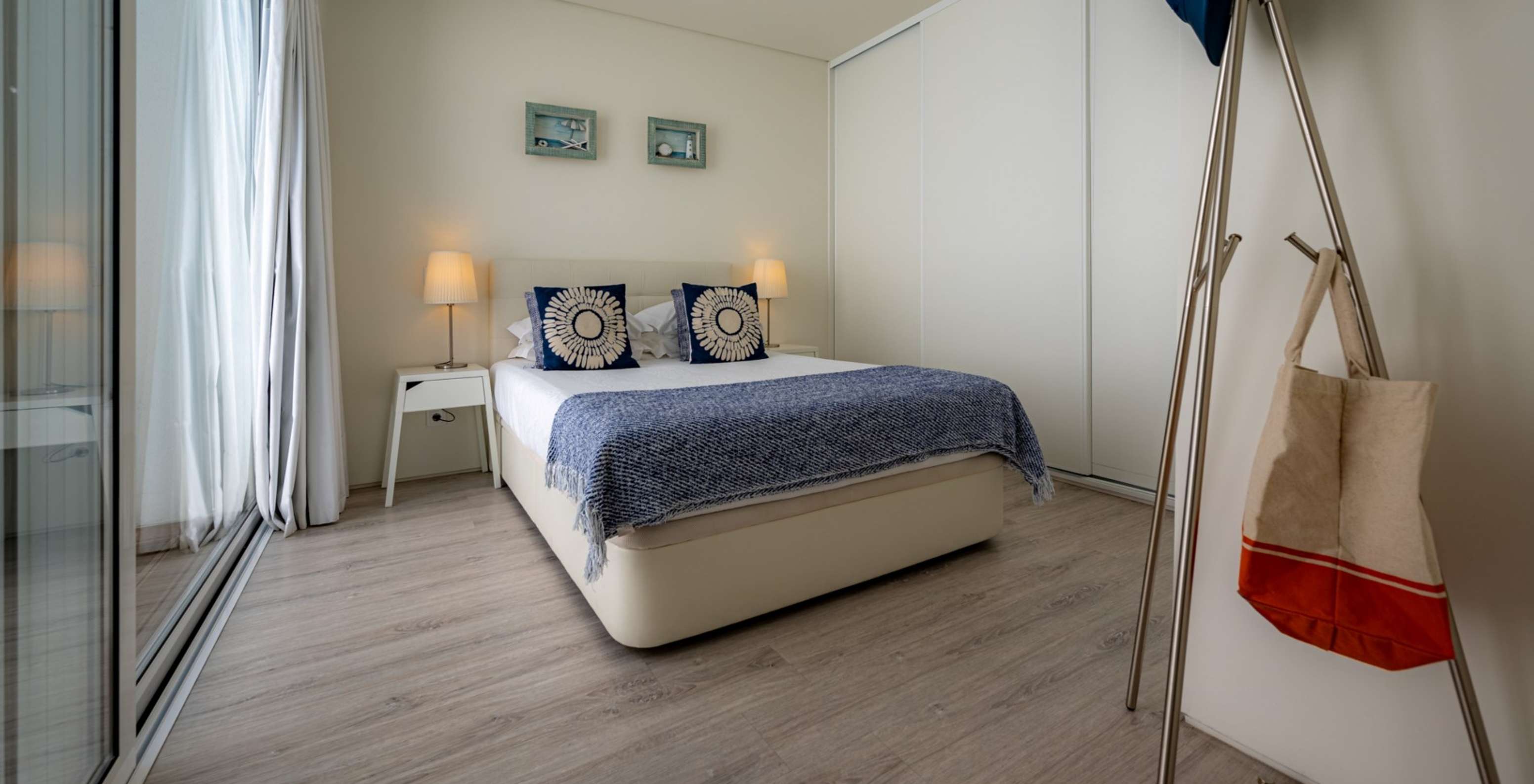 The Green Villa with Private Pool of Pestana Tróia Eco Resort has a double bed with two bedside tables and a bedspread
