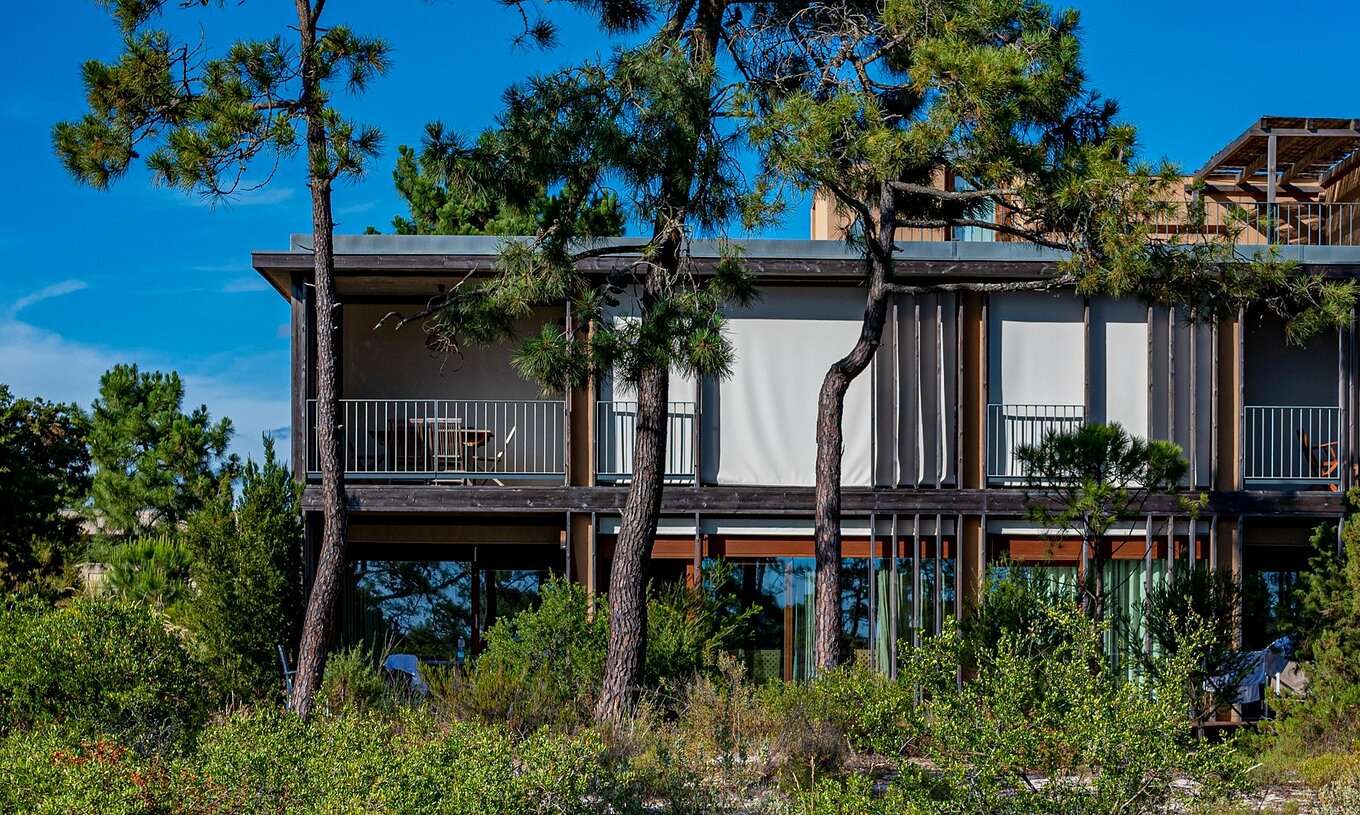 The Eco Village Superior Apartment 1st Floor Premium Views of Pestana Tróia Eco Resort has trees around the villa