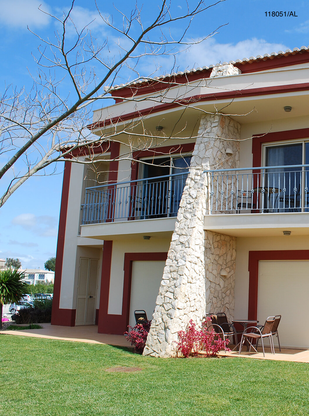 The Pestana Carvoeiro Golf T1 Superior Apartment has an exterior patio with a balcony and grass
