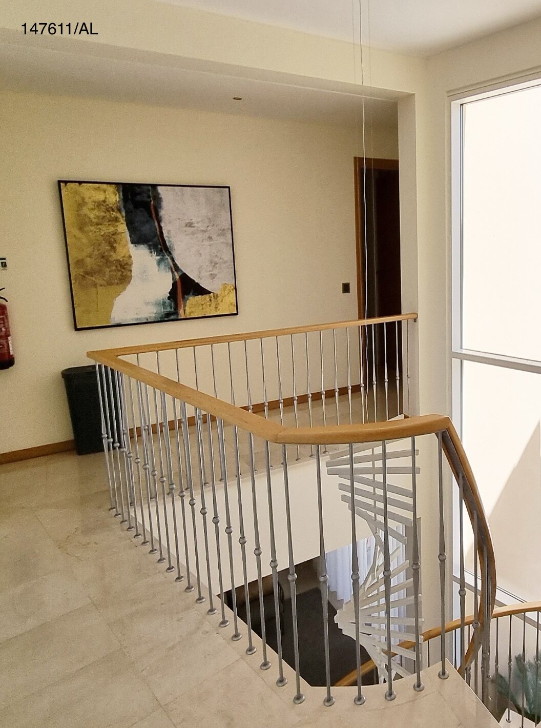 The Pestana Carvoeiro Golf V5 Superior Villa has a hall with stairs and a view of the pool