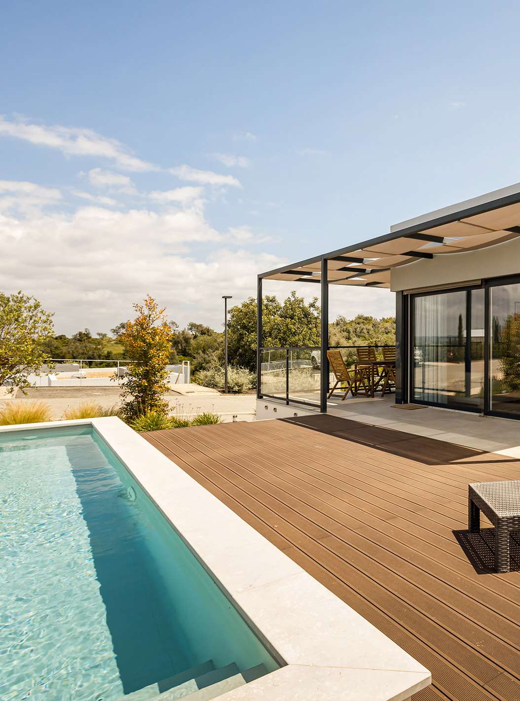 The Premium Villa 3 Bedroom - 5 Adults at Pestana Valley Nature Village has a terrace with a pool and a pergola