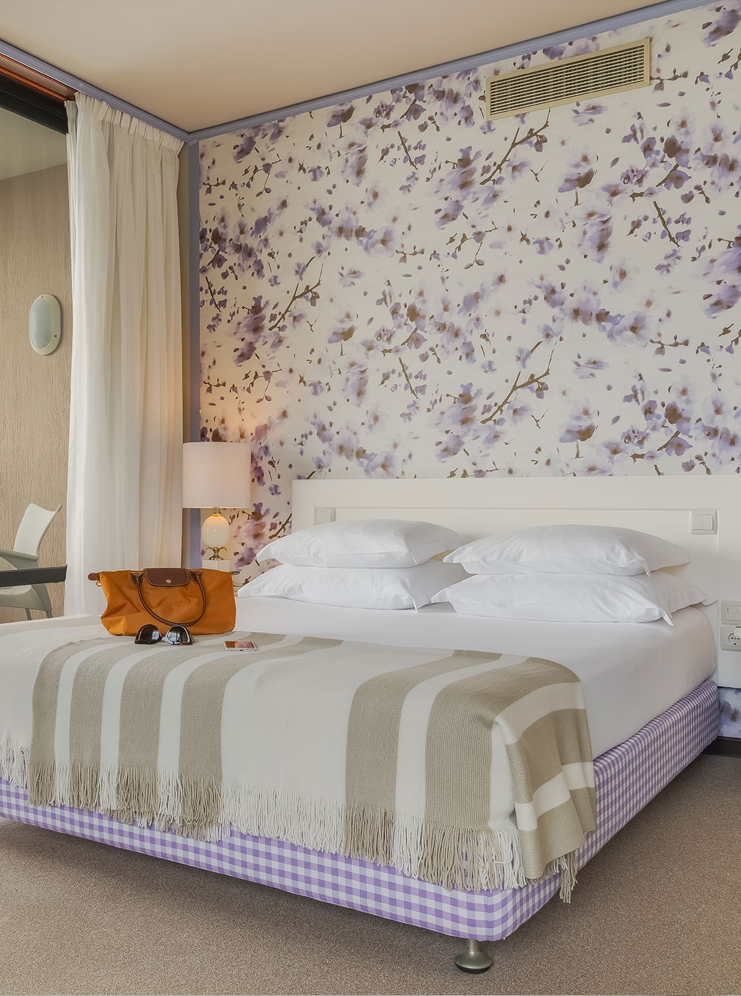 Standard Sea View room at Pestana Bahia Praia has a double bed, with 4 pillows and a balcony with sea view