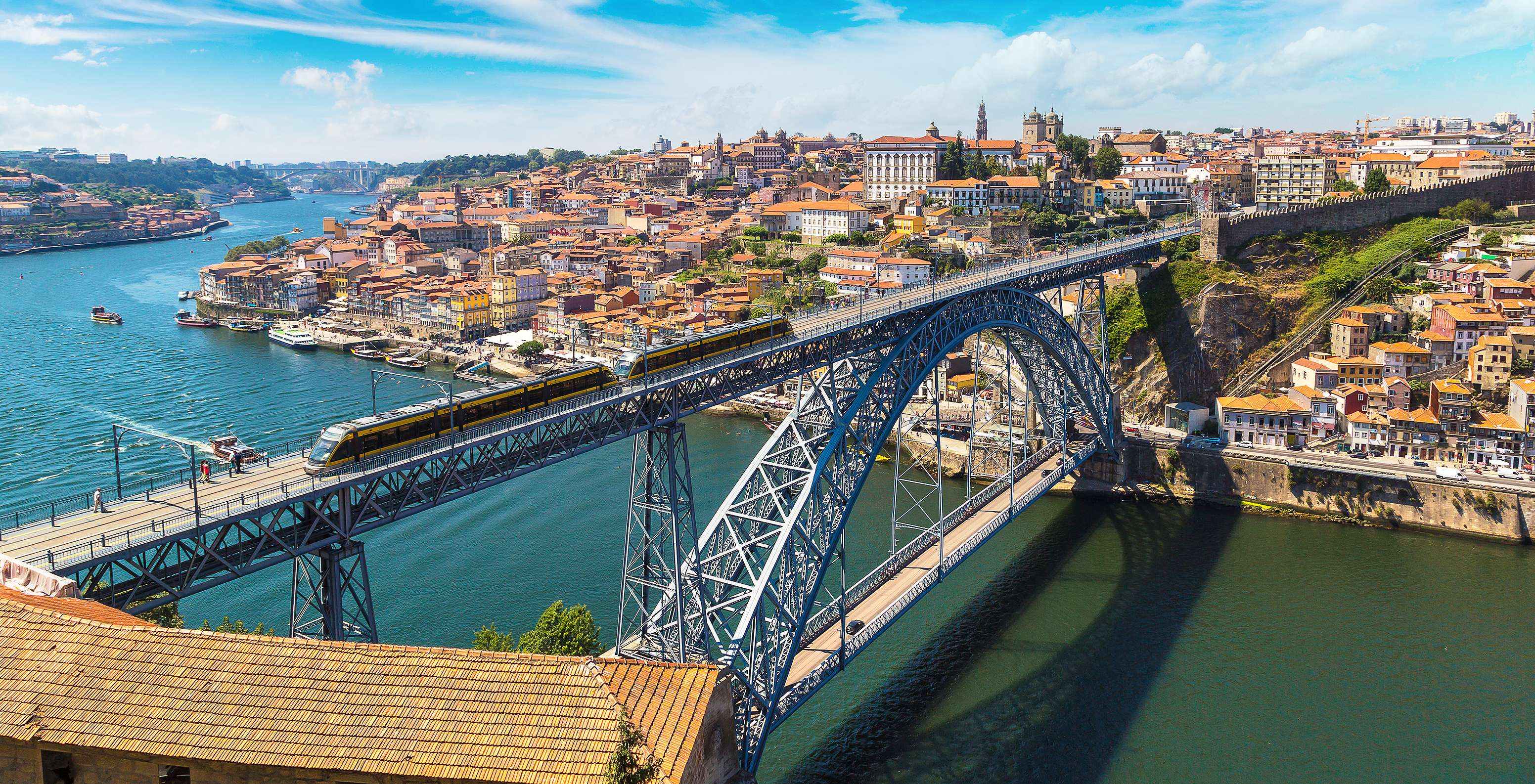 Stay at Pestana Vintage Porto and walk across the iconic Dom Luís I Bridge, enjoying views of the Douro River