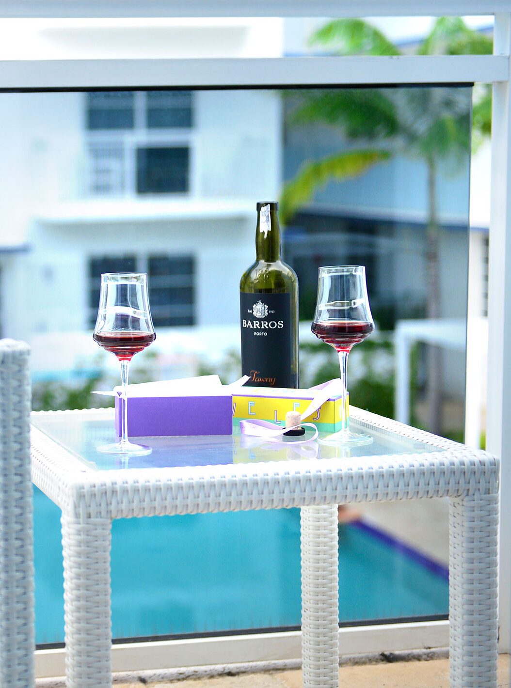 The Two Bedroom Suite with Balcony at Pestana Miami has a table and pool view.