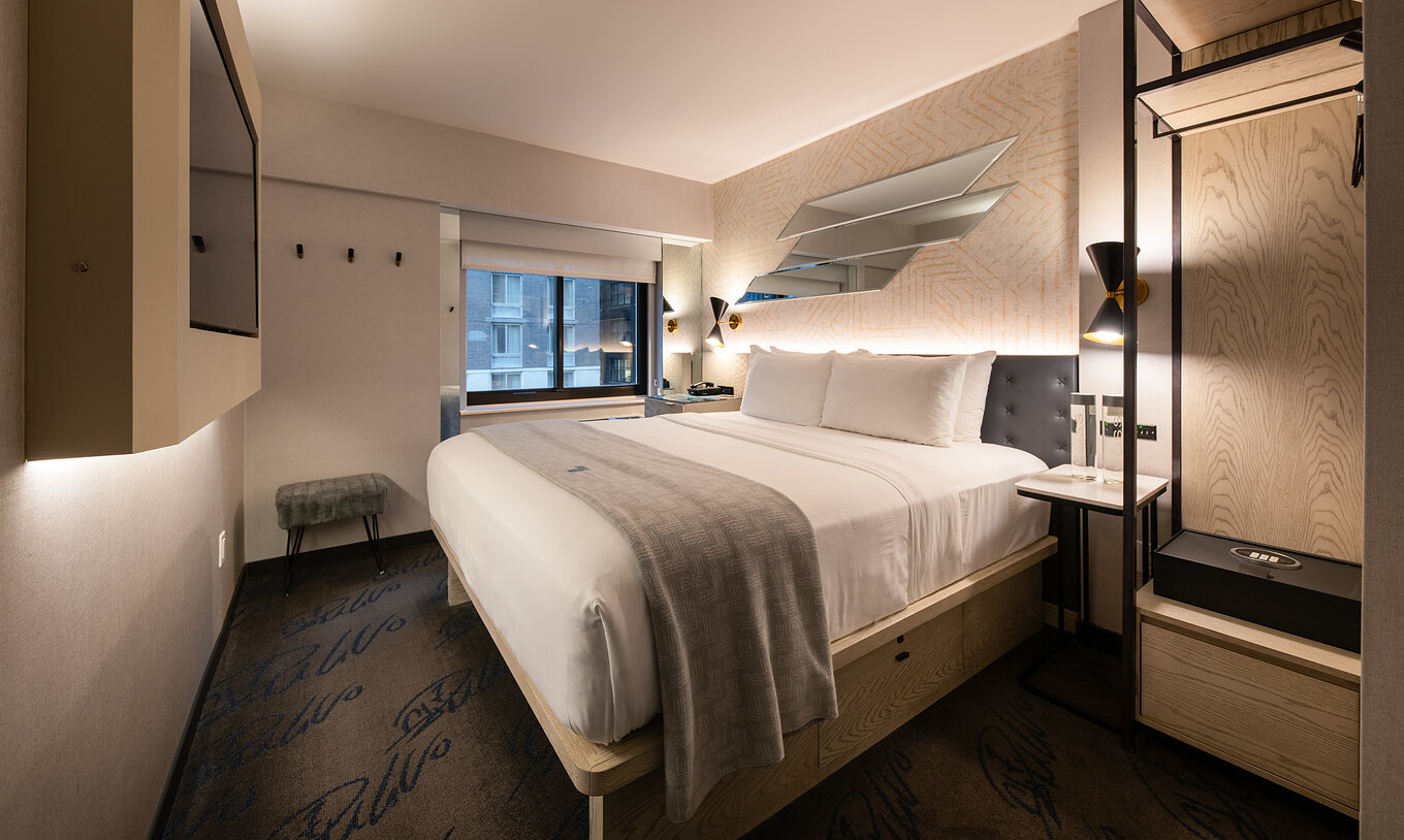The Comfort Street View at Pestana CR7 Times Square has a double bed, TV, and a wardrobe