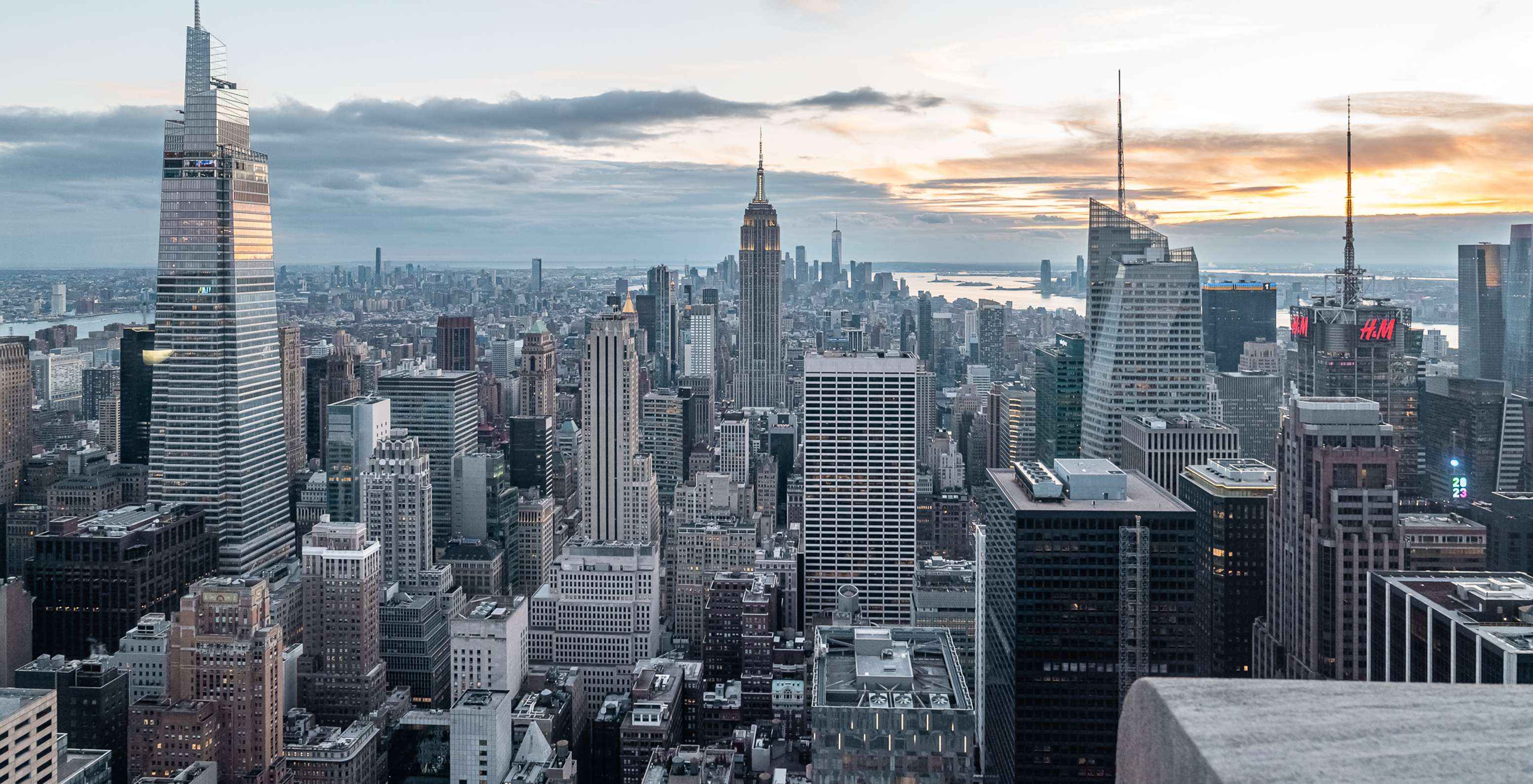 Panoramic view of Manhattan skyline with the Empire State Building among the skyscrapers