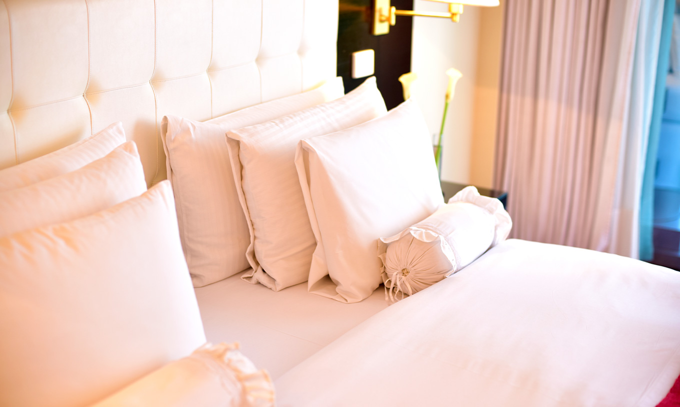 La Queen Estándar del Pestana Buenos Aires cuenta con una cama de matrimonio con varios tipos de almohadas