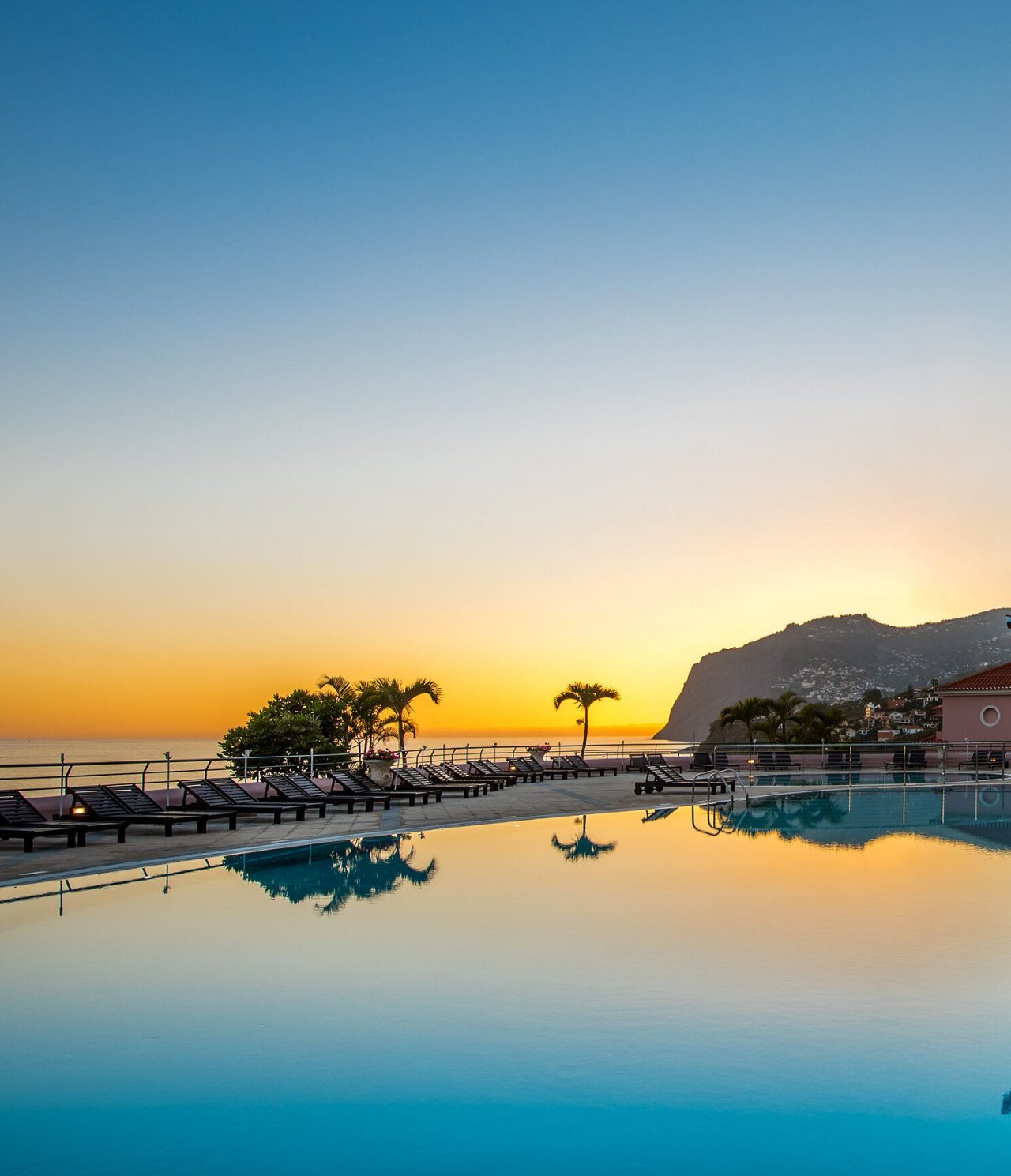 The Sunset Pool Bar, at the 5-Star Hotel in Funchal, sits above the pool, offering views of the sea and island
