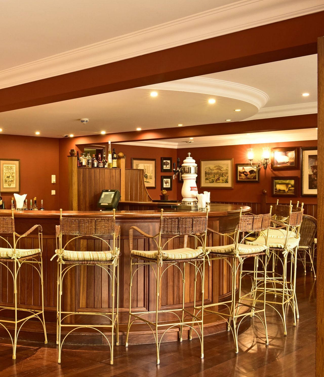 The Cocktail Bar, at the Romantic Hotel in Funchal, Madeira, has a counter with high stools and red walls