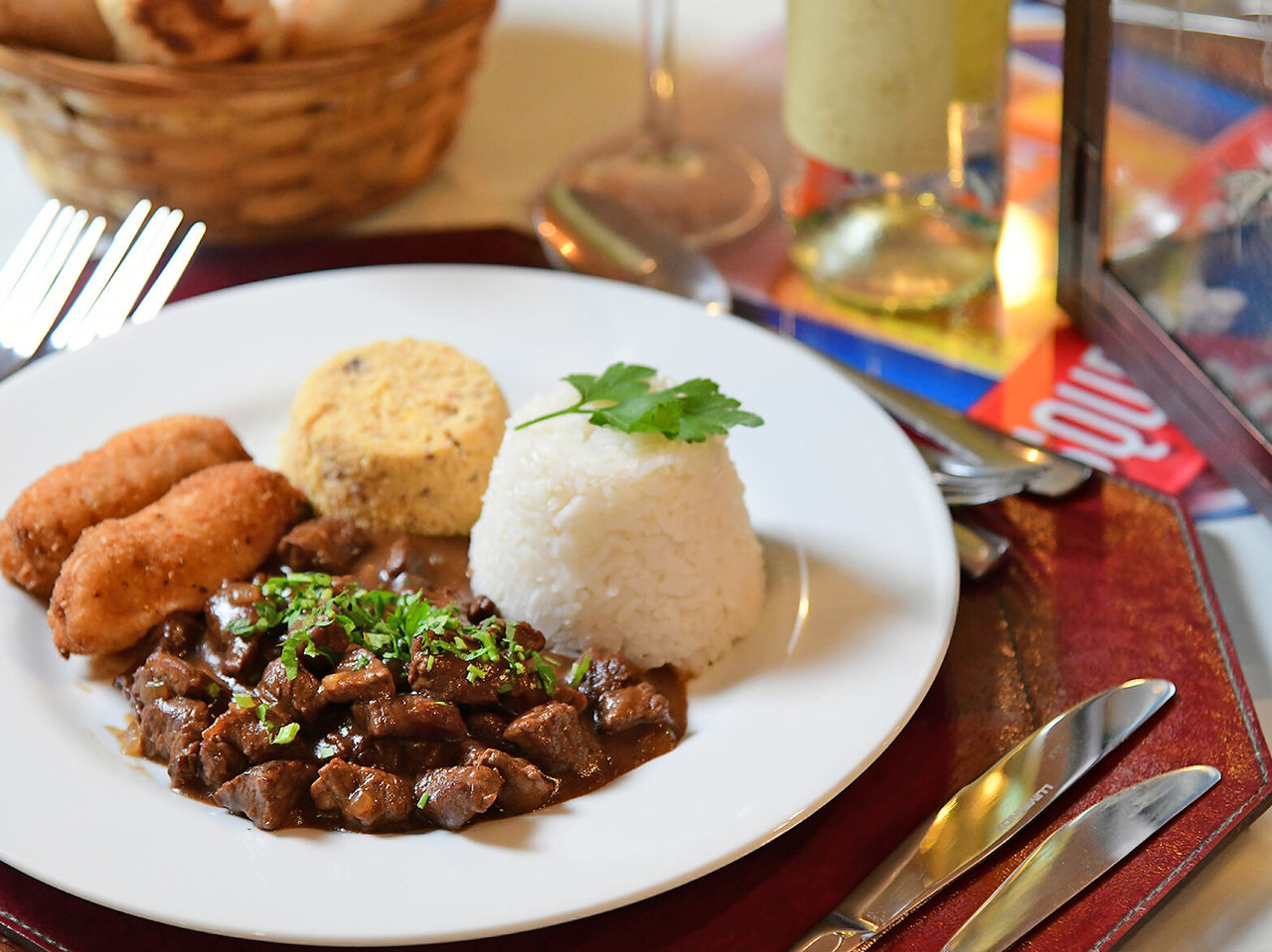 The Lobby bar, at the Hotel in the Center of São Paulo, serves Brazilian dishes such as meat with farofa, rice and fried bananas